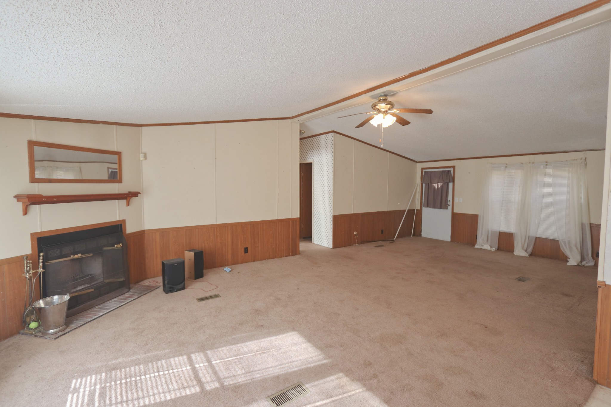 2051 Canoe Branch Road Lebanon, TN 37087 - Photo 6 of 18 a spacious bedroom with a bed and a fireplace