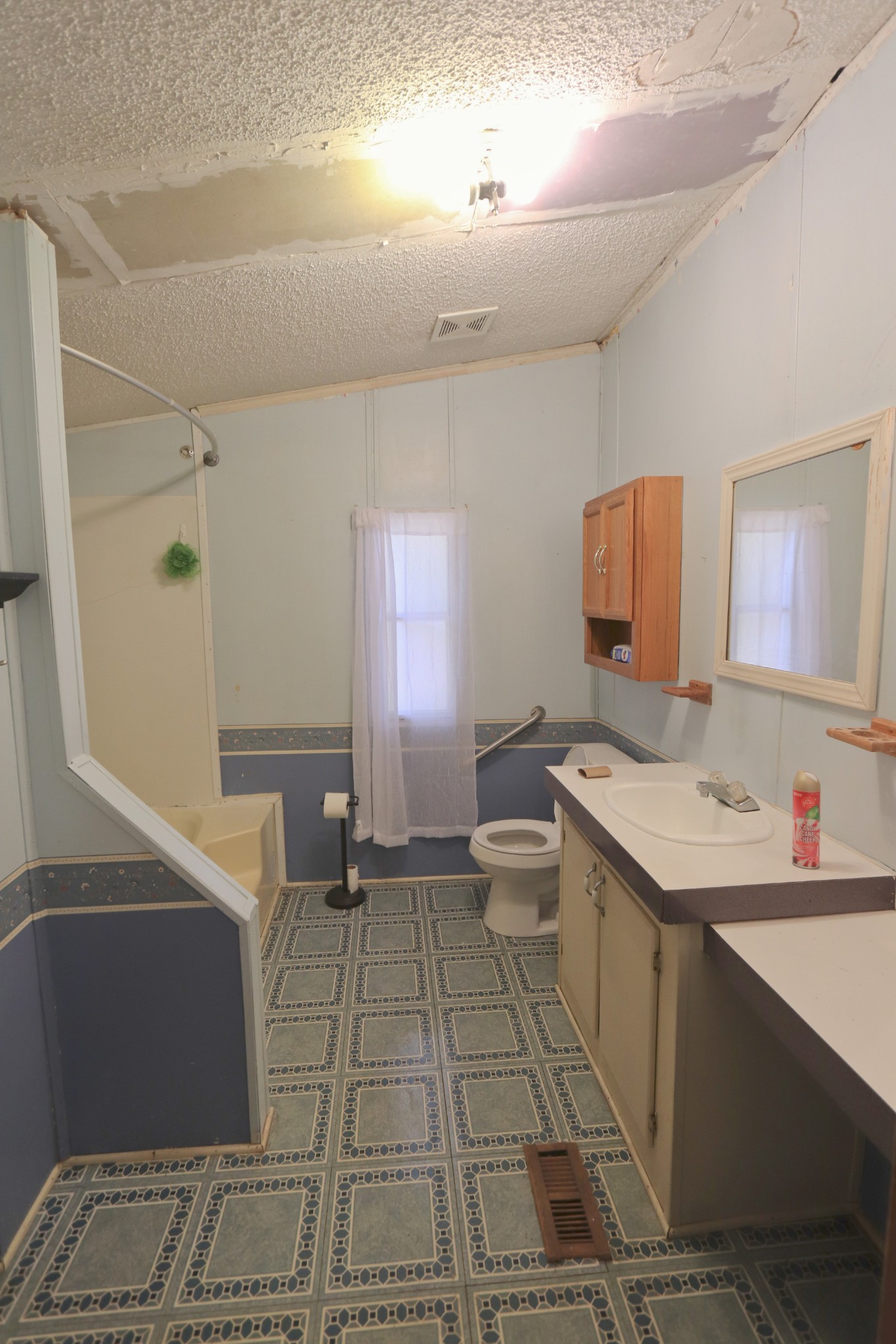 2051 Canoe Branch Road Lebanon, TN 37087 - Photo 8 of 18 a bathroom with a sink toilet and mirror