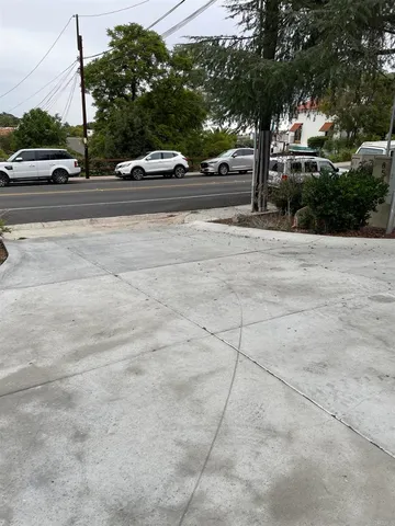 a view of street with houses