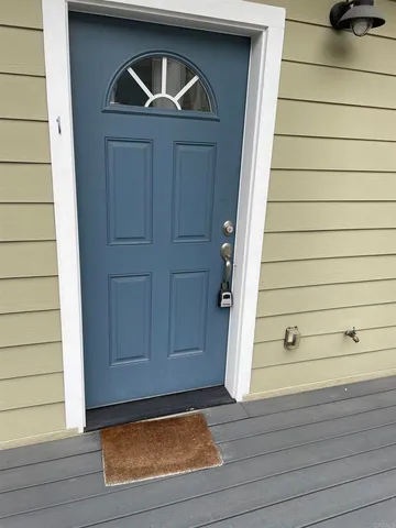 a front view of a house with garage