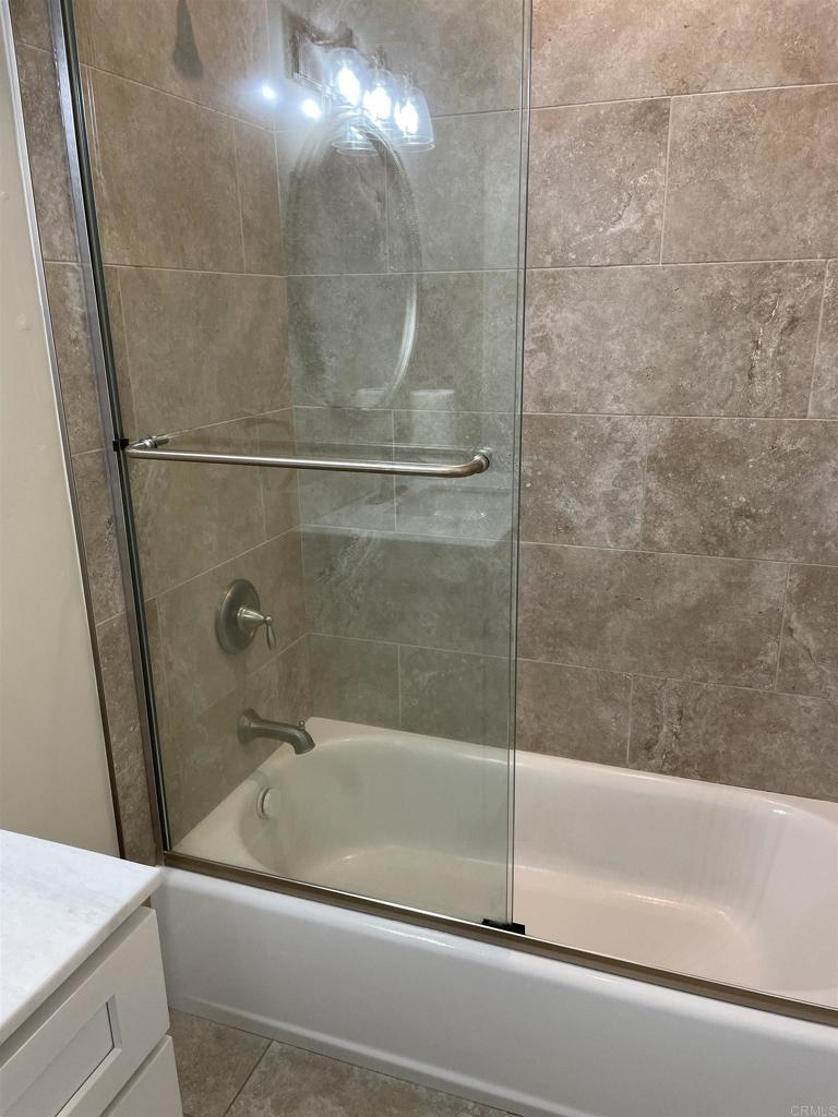 8545 Lemon Avenue, Unit 1 La Mesa, CA 91941 - Photo 21 of 28 a bathroom with a bathtub