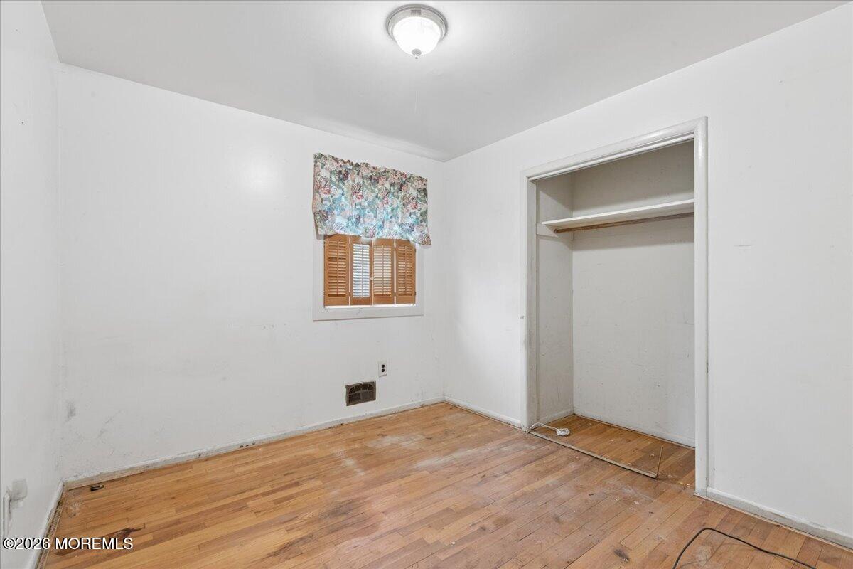 355 Toms River Road Jackson, NJ 08527 - Photo 11 of 21 a view of empty room with wooden floor