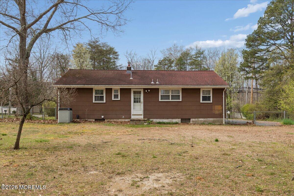 355 Toms River Road Jackson, NJ 08527 - Photo 19 of 21 a house that has a tree in front of it