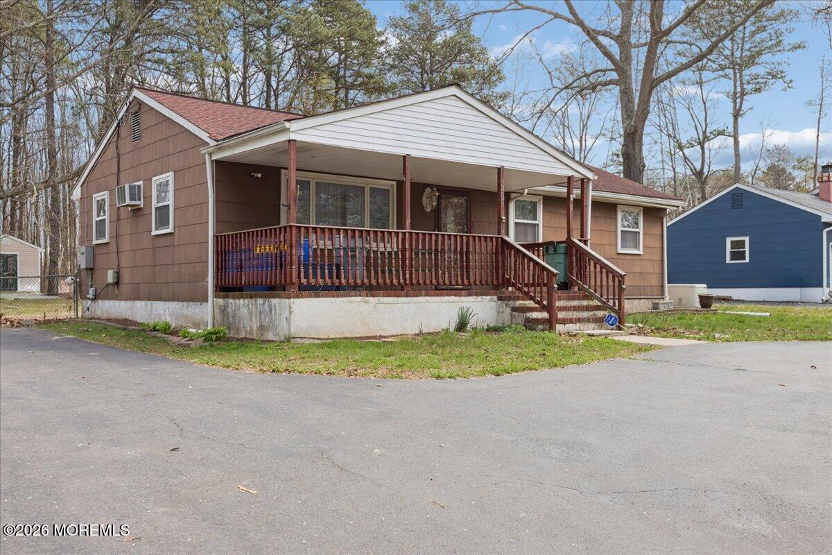 355 Toms River Road Jackson, NJ 08527 - Photo 2 of 21 front view of a house with a yard