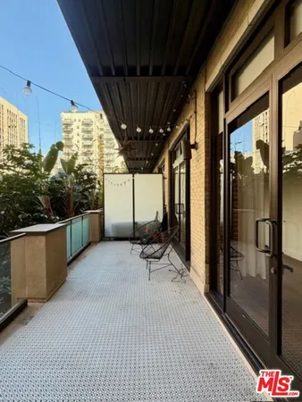 a outdoor space with lots of potted plants
