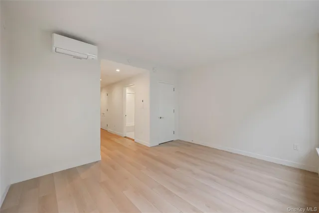 a kitchen with a stove a sink and a microwave