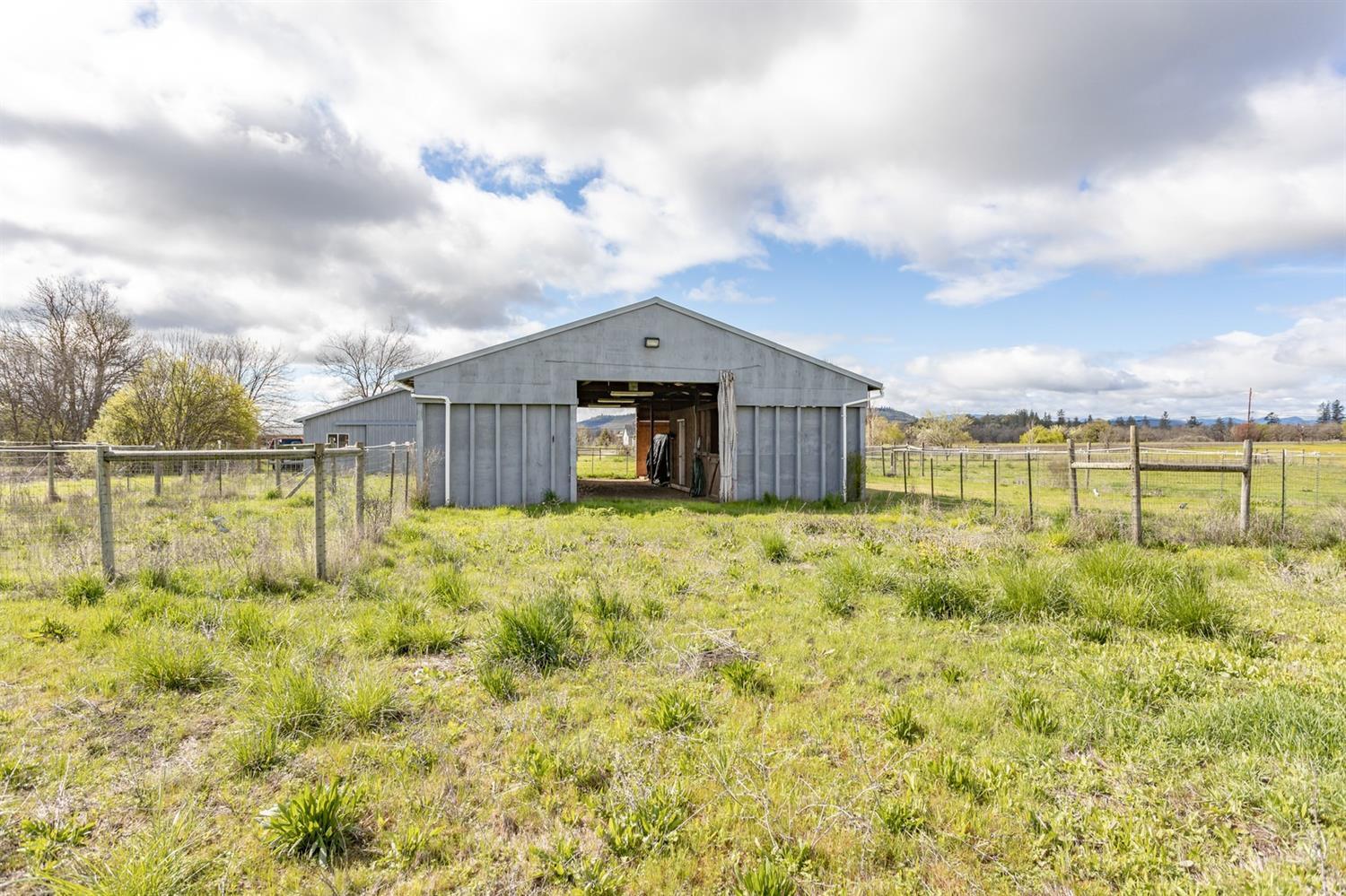 4178 Dodge Road White City, OR 97503 - Photo 25 of 35 a view of a house with a yard and sitting area