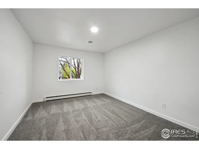 view of an empty room and window