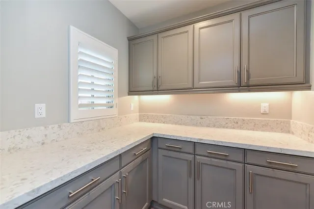 a sink with cabinets