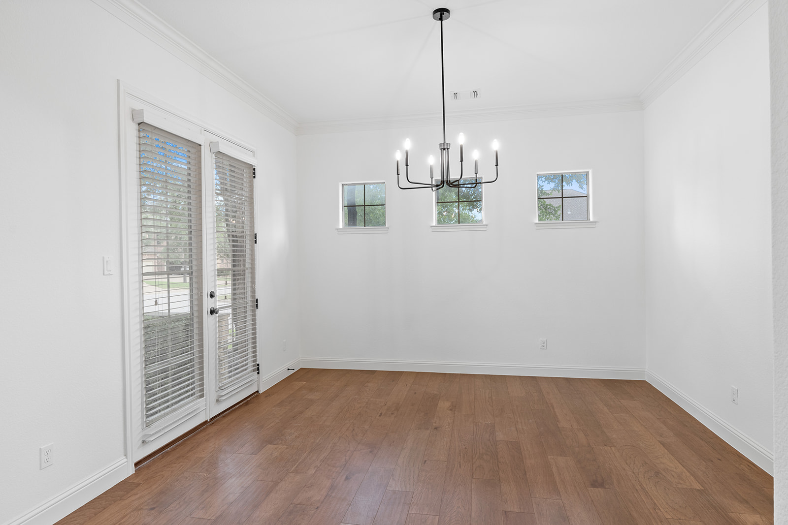 114 North Saddle Ridge Drive Cedar Park, TX 78613 - Photo 7 of 40 a view of empty room with wooden floor and fan