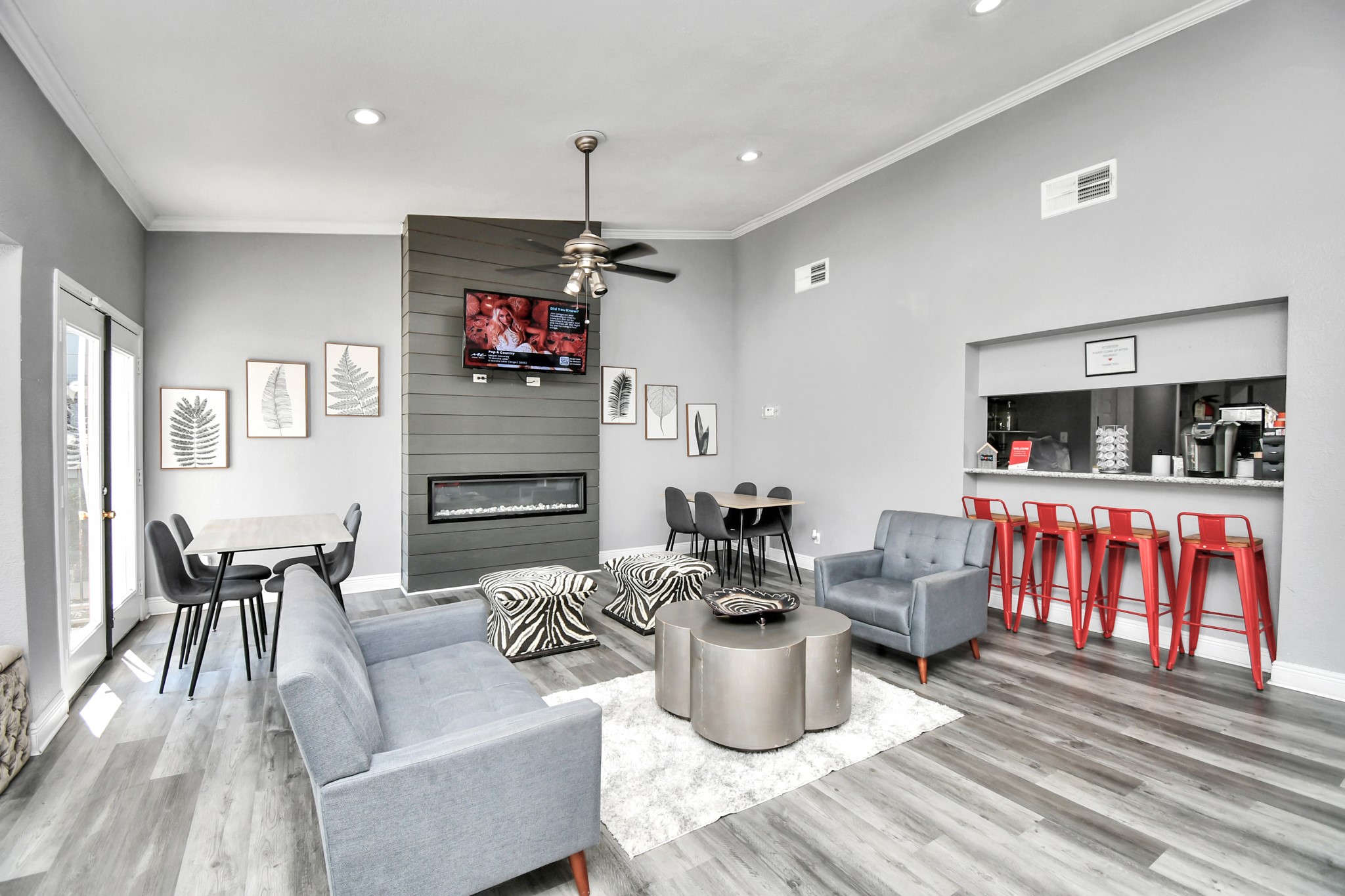 5959 Bonhomme Road, Unit 164 Houston, TX 77036 - Photo 5 of 27 a living room with fireplace furniture and a flat screen tv