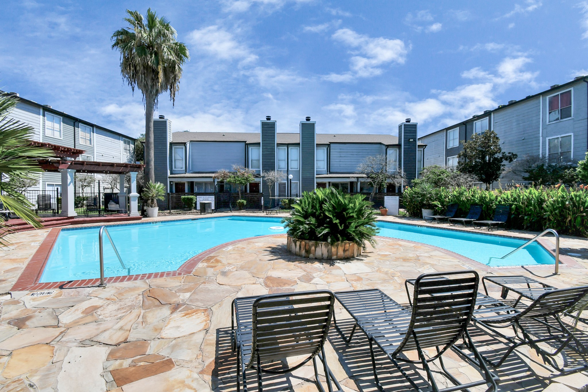 5959 Bonhomme Road, Unit 164 Houston, TX 77036 - Photo 7 of 27 a view of swimming pool with outdoor seating and plants