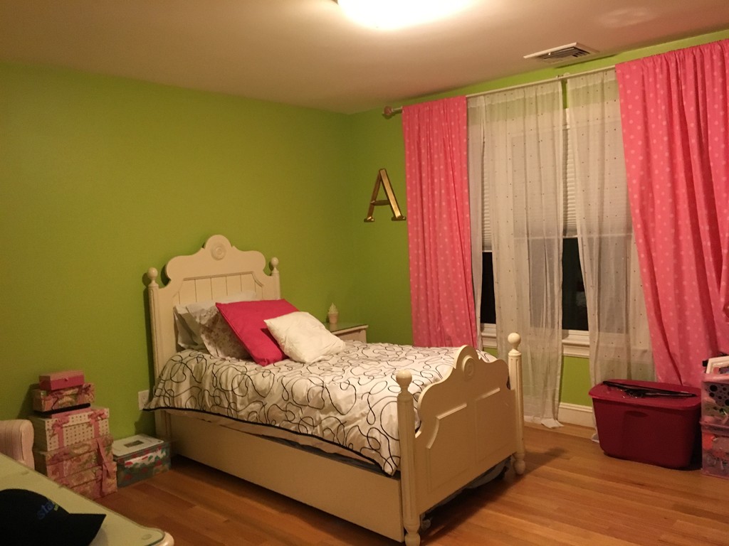 3 Fairbanks Road Lexington, MA 02421 - Photo 16 of 18 a bedroom with a bed and wooden floor