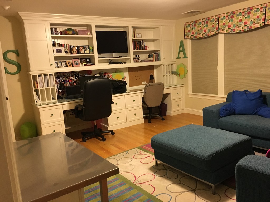 3 Fairbanks Road Lexington, MA 02421 - Photo 18 of 18 a view of a livingroom with workspace and a couch