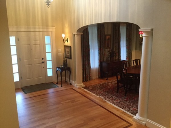3 Fairbanks Road Lexington, MA 02421 - Photo 3 of 18 a view of a hallway with wooden floor and a bathroom