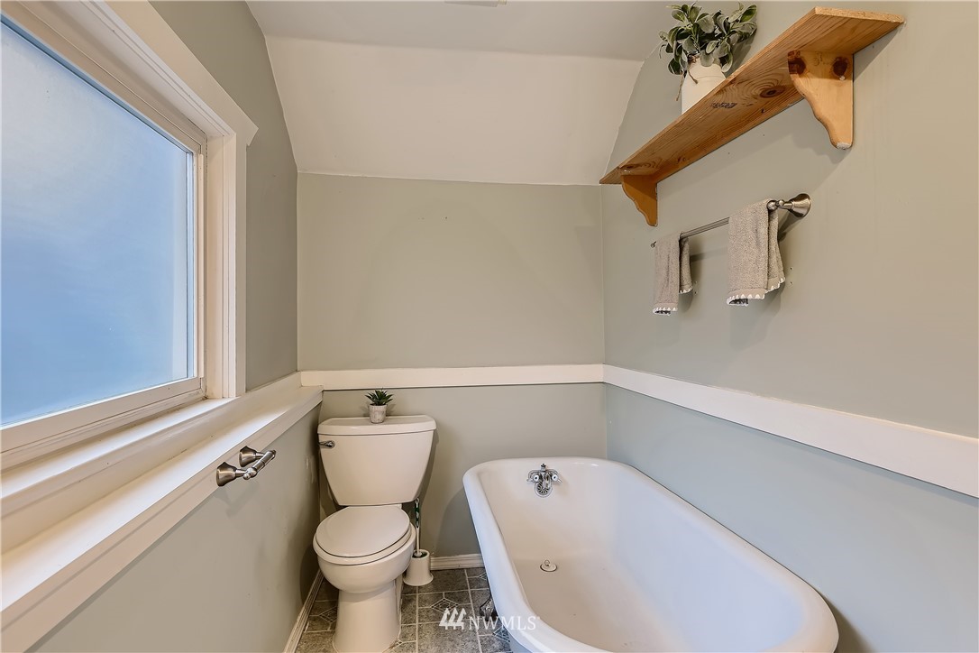 10308 Northeast 186th Street Bothell, WA 98011 - Photo 14 of 25 a bathroom with a toilet and a sink