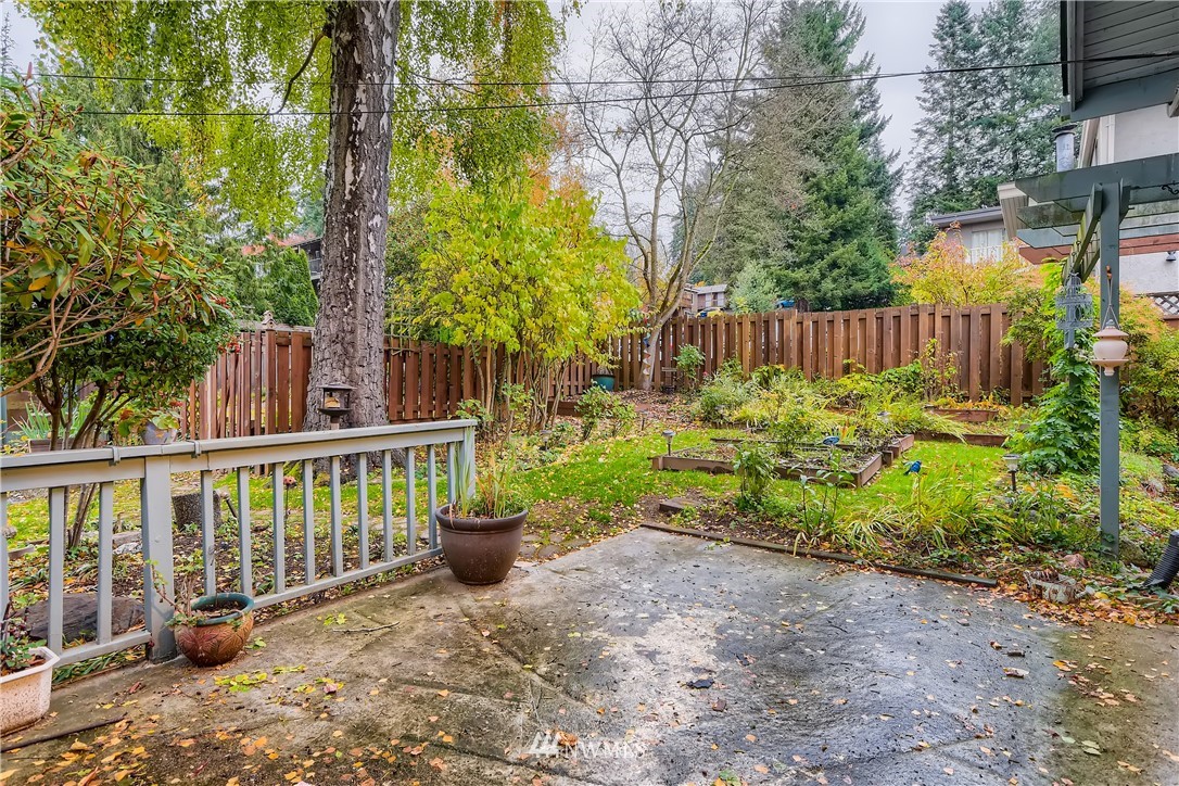 10308 Northeast 186th Street Bothell, WA 98011 - Photo 20 of 25 a view of a backyard with plants and large trees