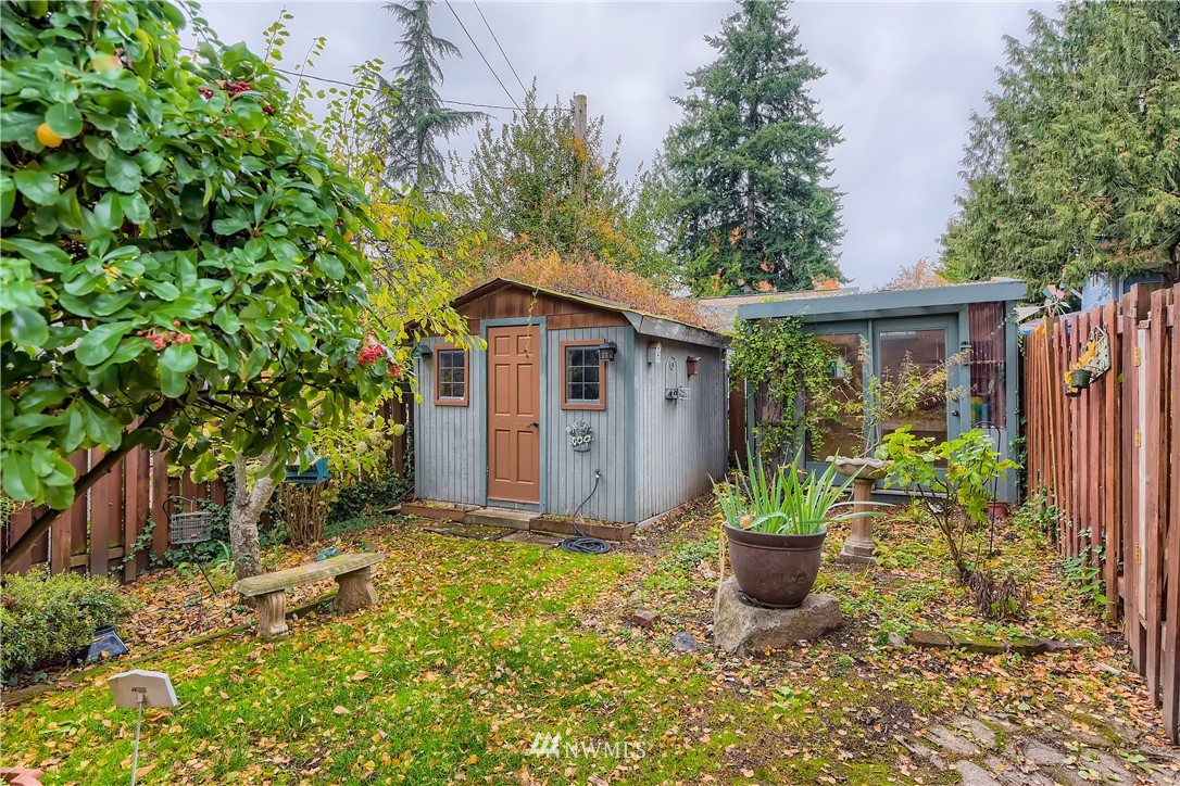 10308 Northeast 186th Street Bothell, WA 98011 - Photo 21 of 25 a view of a house with backyard and garden