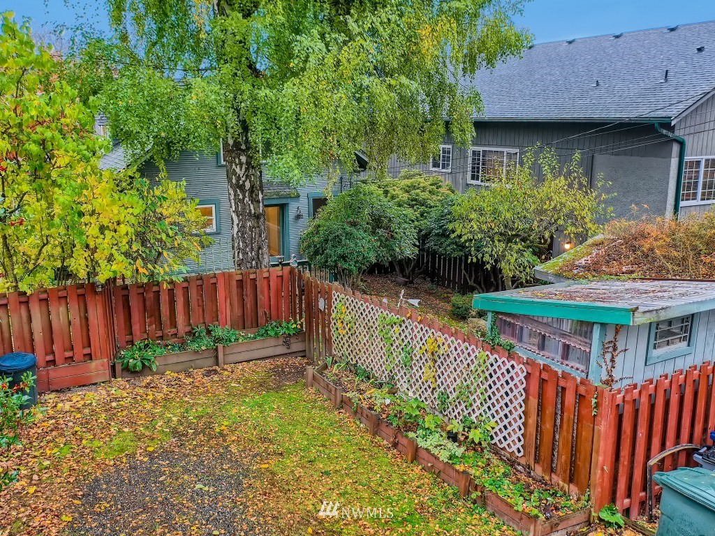 10308 Northeast 186th Street Bothell, WA 98011 - Photo 23 of 25 a front view of house with trees in the background