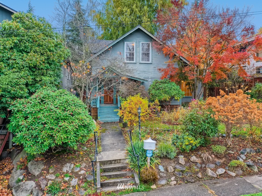 10308 Northeast 186th Street Bothell, WA 98011 - Photo 4 of 25 a front view of a house with a yard