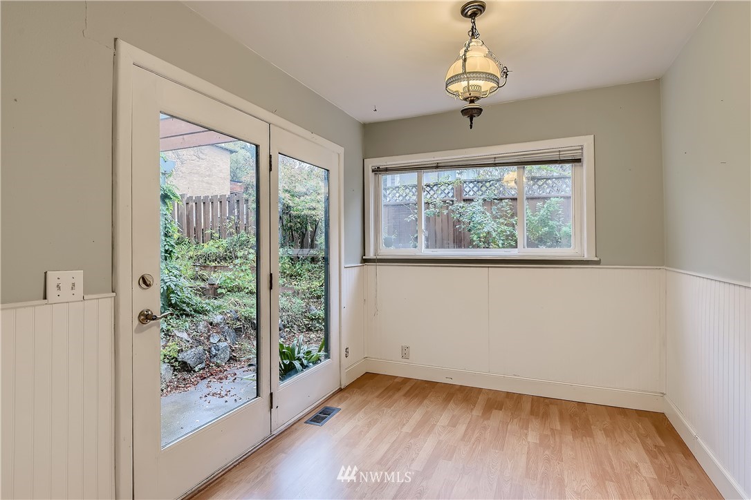 10308 Northeast 186th Street Bothell, WA 98011 - Photo 10 of 25 a view of empty room with wooden floor and fan