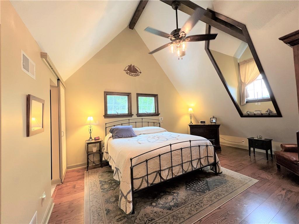 1673 Methodist Road Greenville, PA 16125 - Photo 14 of 25 a bedroom with a bed a table and painting on the wall