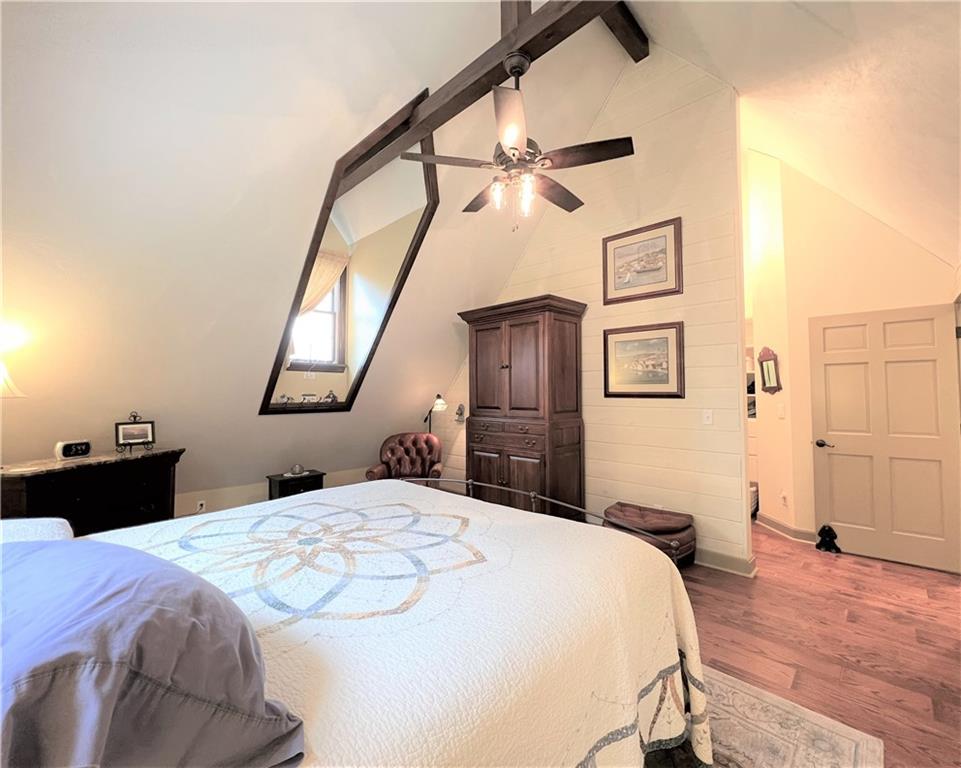 1673 Methodist Road Greenville, PA 16125 - Photo 15 of 25 a bedroom with a bed and a chandelier