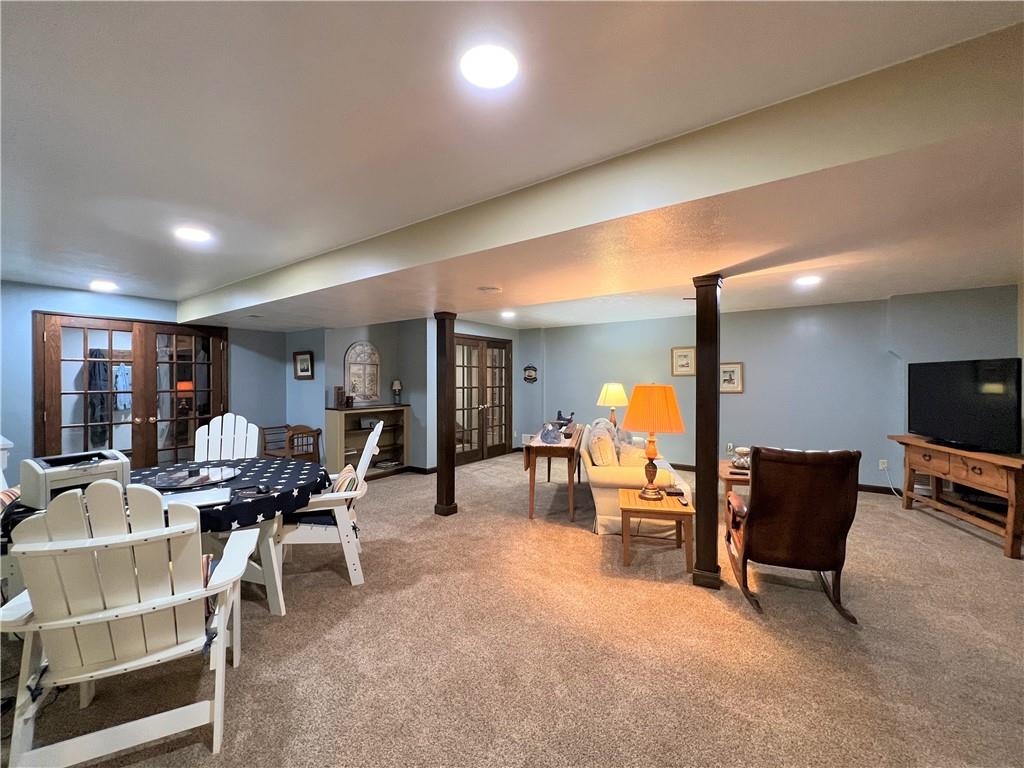 1673 Methodist Road Greenville, PA 16125 - Photo 21 of 25 a living room with furniture and a flat screen tv