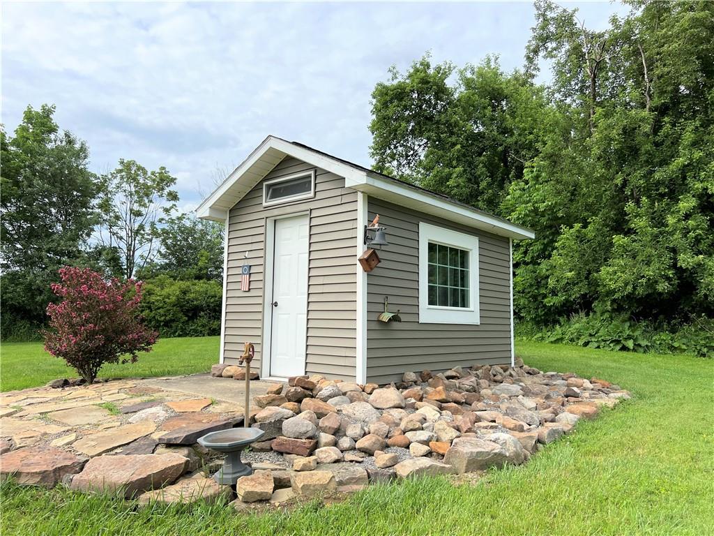 1673 Methodist Road Greenville, PA 16125 - Photo 5 of 25 a front view of house with backyard and trees