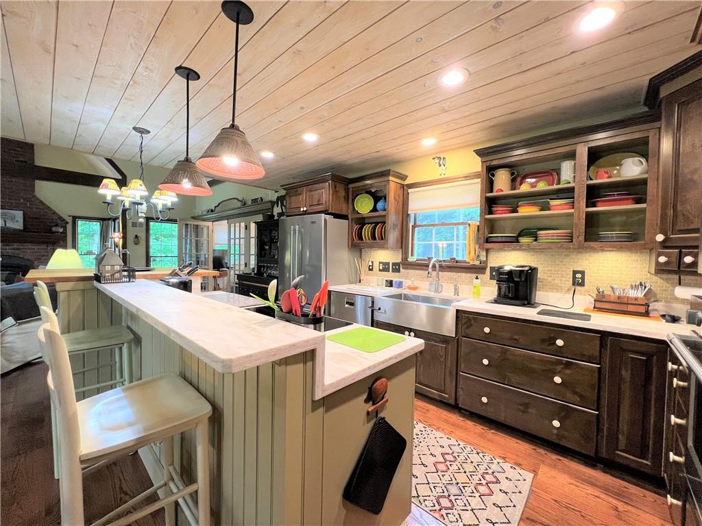 1673 Methodist Road Greenville, PA 16125 - Photo 9 of 25 a kitchen with a sink a counter space appliances and cabinets