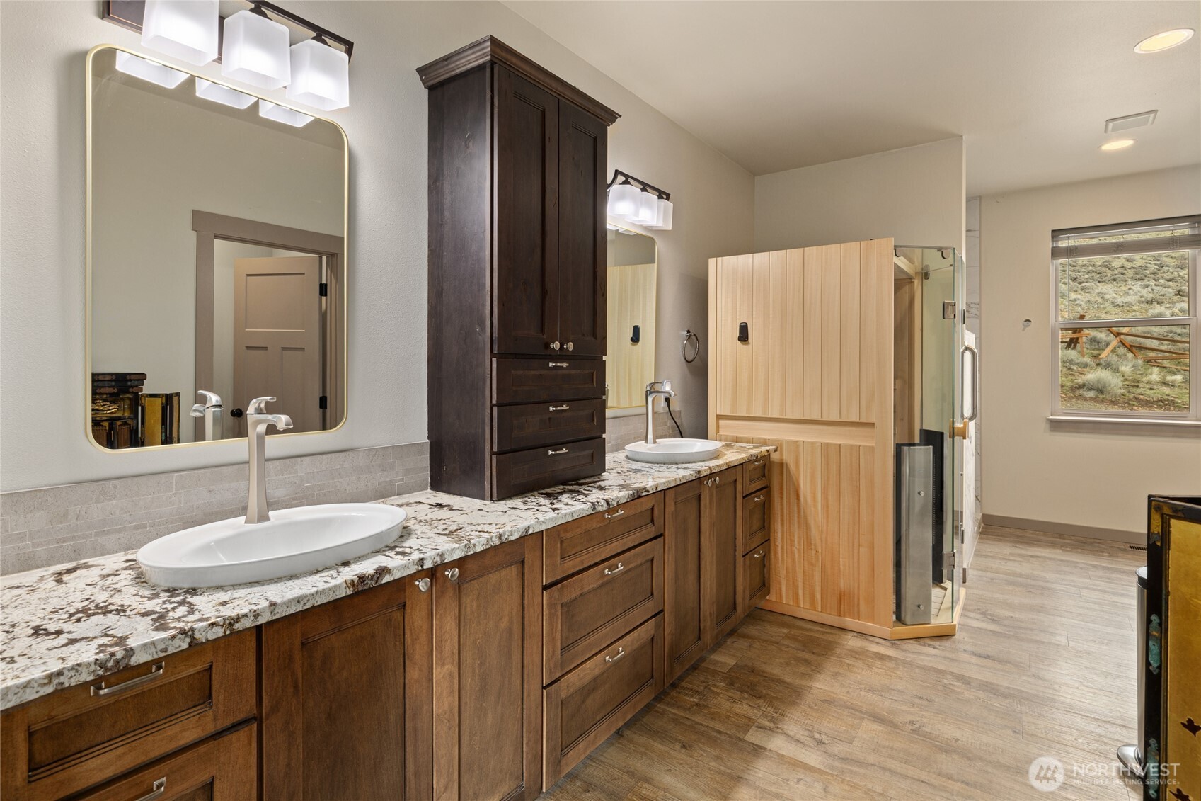 6083 Secret Canyon Road Ellensburg, WA 98926 - Photo 20 of 40 a kitchen with granite countertop a refrigerator and a sink