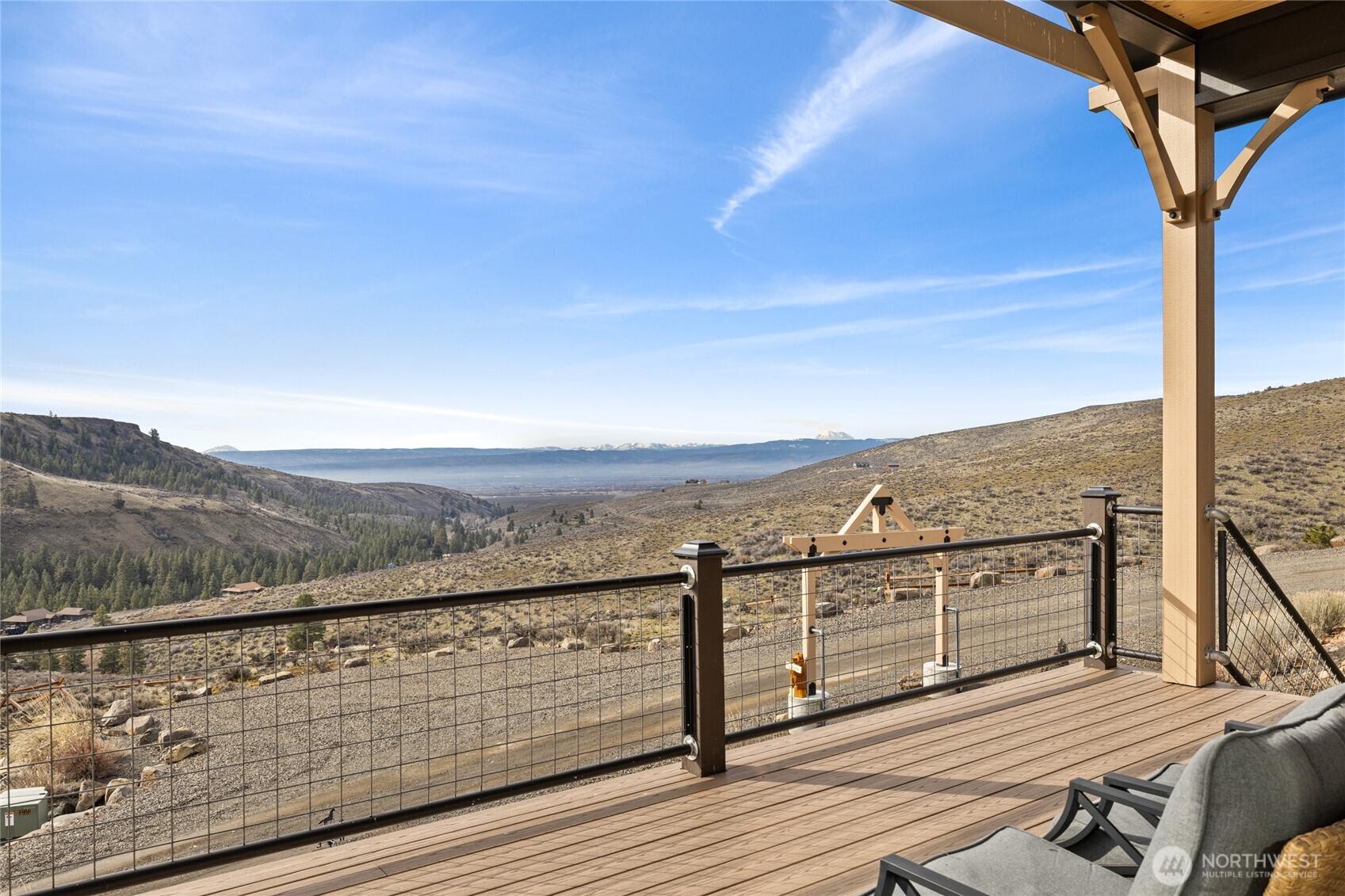 6083 Secret Canyon Road Ellensburg, WA 98926 - Photo 29 of 40 a view of balcony with wooden floor and mountain view