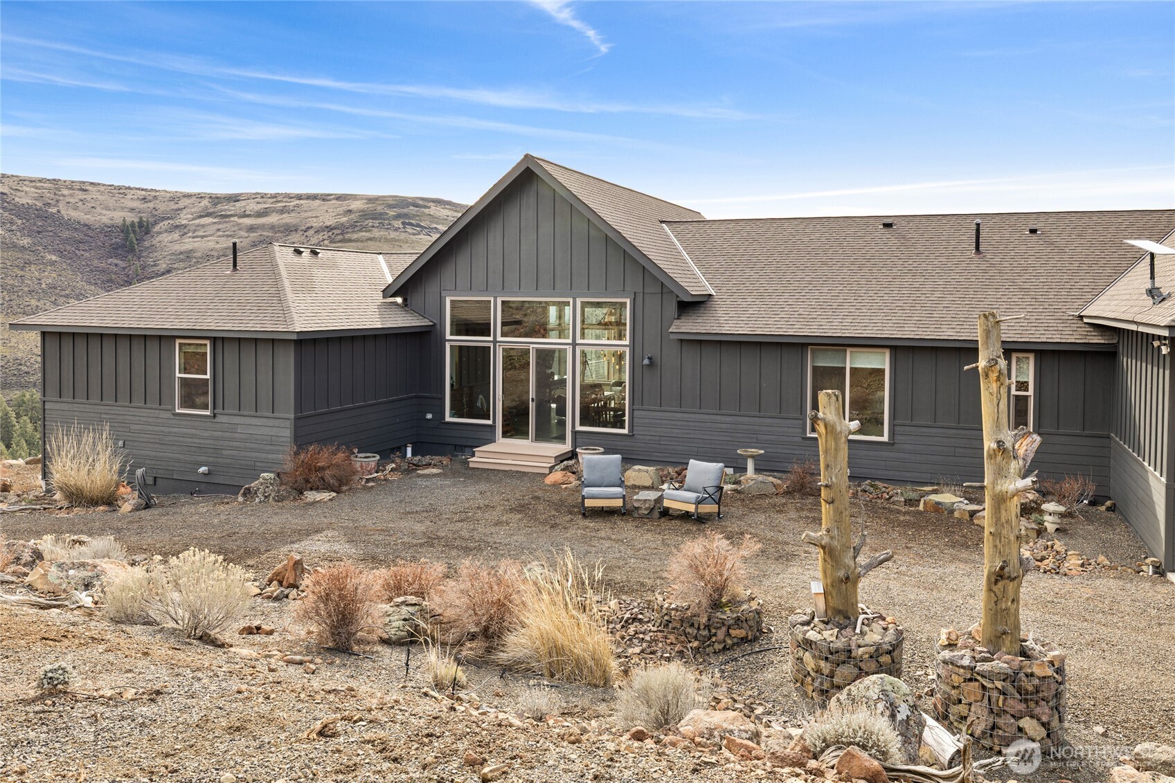6083 Secret Canyon Road Ellensburg, WA 98926 - Photo 30 of 40 a view of a house with a patio