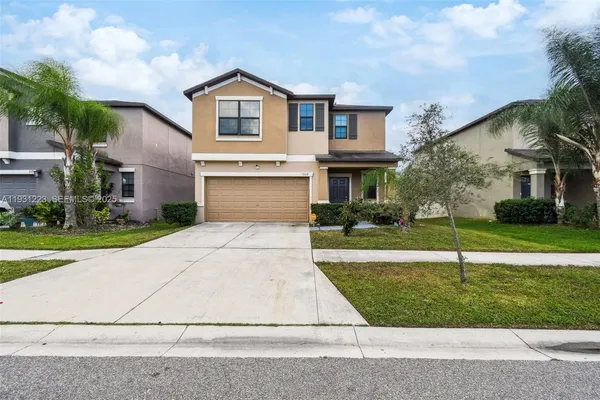 front view of house with a yard