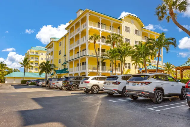 a view of a cars parked in front of a building