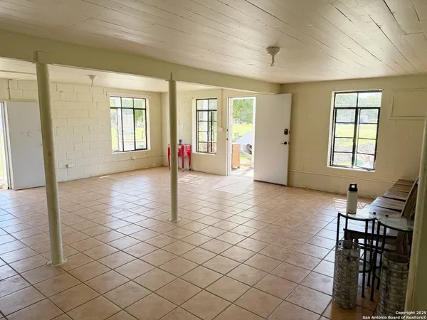 a view of an empty room and window