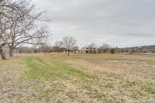 a view of backyard of house