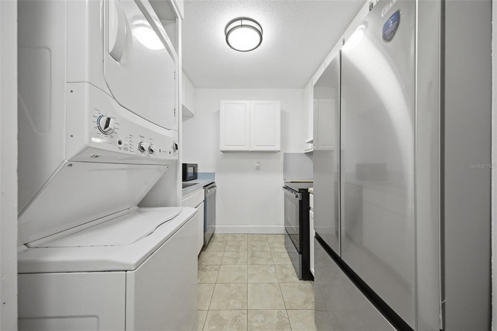 141 Fernery Road, Unit A3 Lakeland, FL 33809 - Photo 6 of 40 a utility room with dryer and washer
