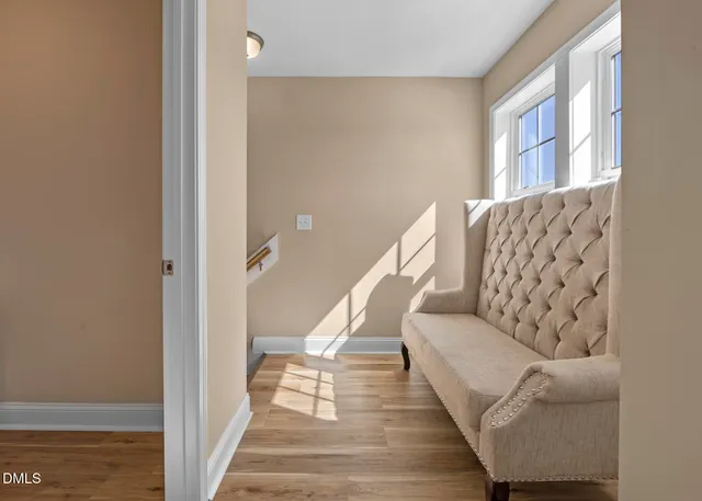 a kitchen with stainless steel appliances granite countertop a stove and a wooden floors