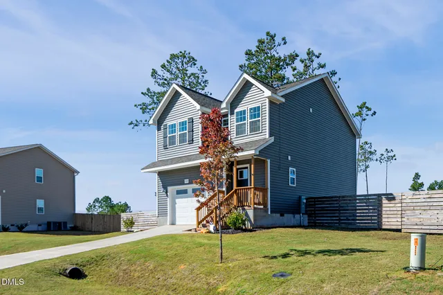 a picture of a bench in front of a wall