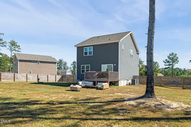 a view of a house with swimming pool