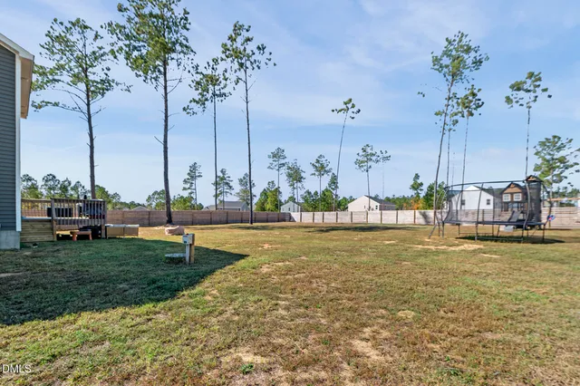 a view of a swimming pool with an outdoor space