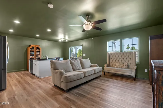 a bathroom with a shower and a sink