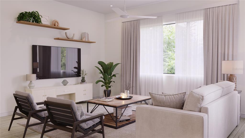 2611 Southwest Williston Road, Unit 3 Gainesville, FL 32608 - Photo 25 of 56 a living room with furniture and a window
