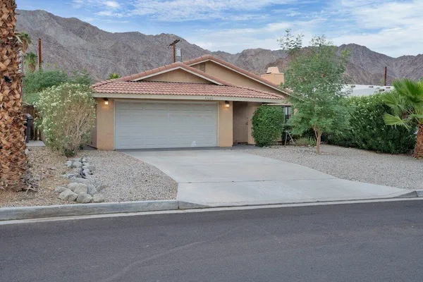 front view of a house with a garage