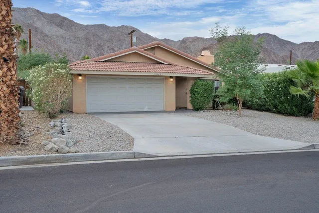 front view of a house with a garage