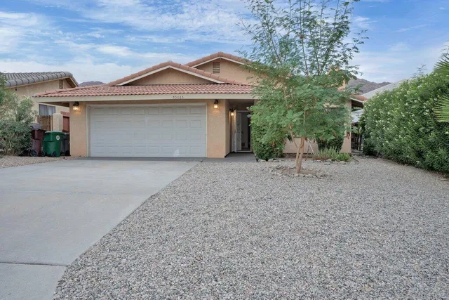 front view of a house with a street