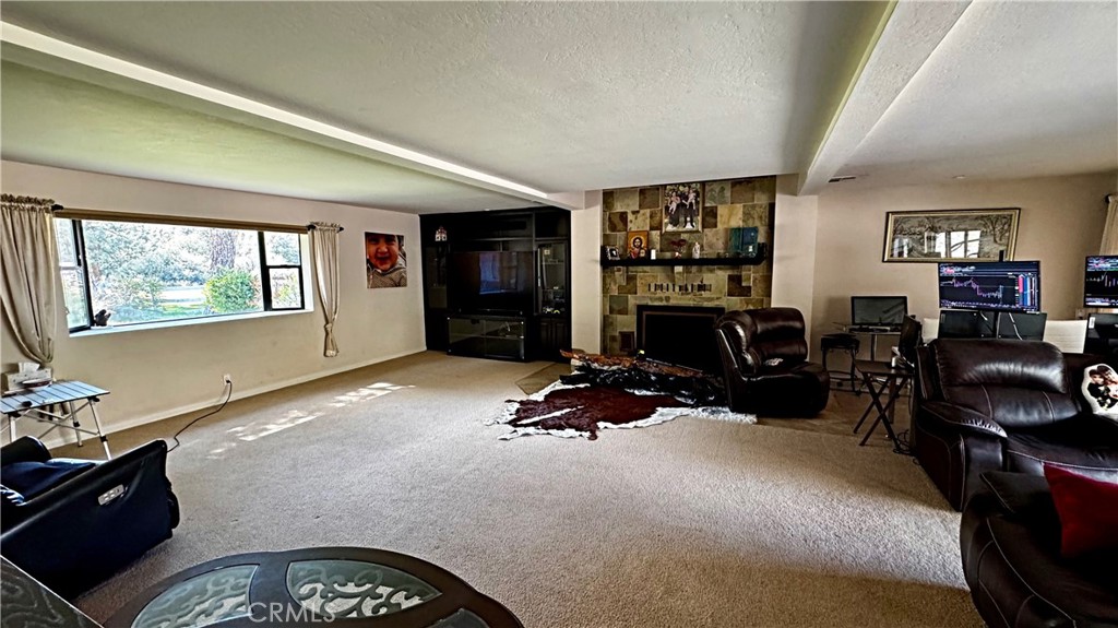 132 Rio Del Loma Kernville, CA 93238 - Photo 11 of 33 a bedroom with furniture window and flat screen tv