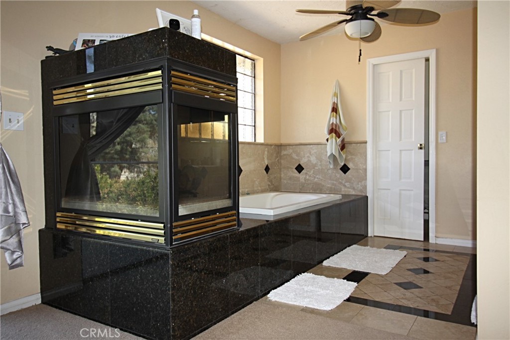 132 Rio Del Loma Kernville, CA 93238 - Photo 14 of 33 a bathroom with a bathtub and a shower