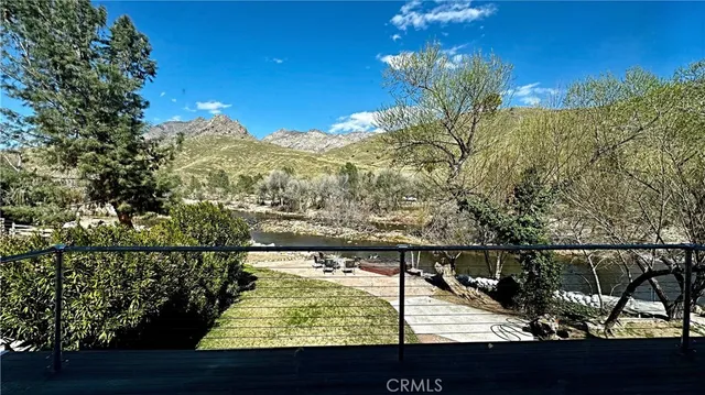 a view of a lake from a balcony